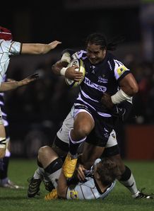 Andy-Tuilagi-of-Sale-Sharks-is-tackled-by-Bre_2533018.jpg